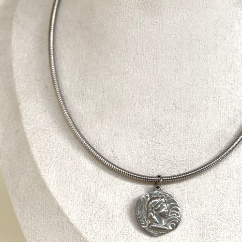 Steel necklace new with woman face element silver