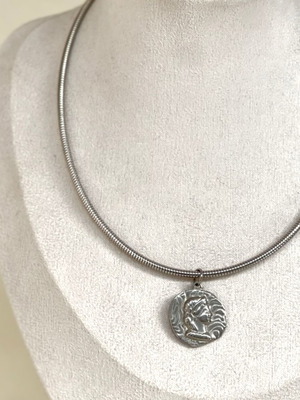 Steel necklace new with woman face element silver