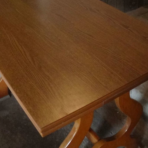 Wooden dining table used with extension