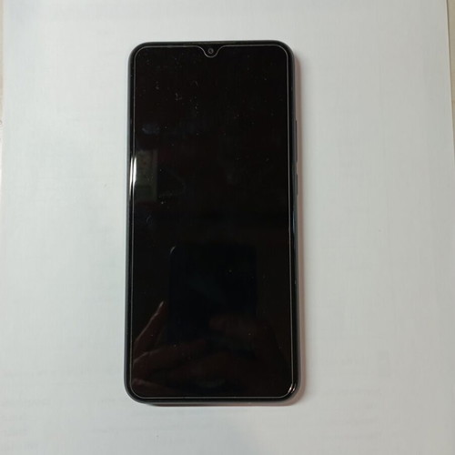 Redmi 9 64GB used smartphone with 2 cases and 2 screen protectors