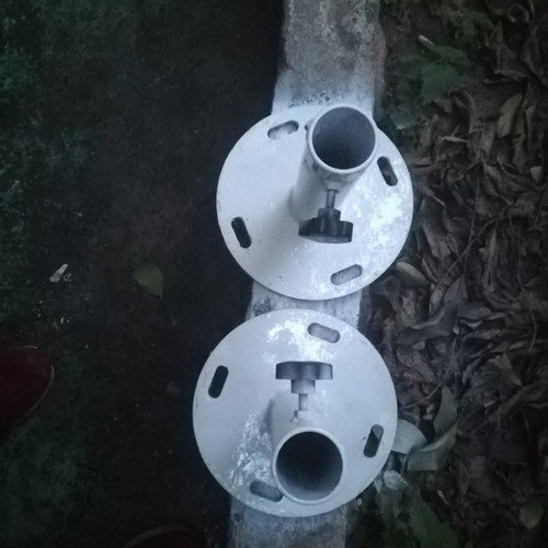 Heavy-duty umbrella bases made of solid iron for professional umbrellas with floor plugs