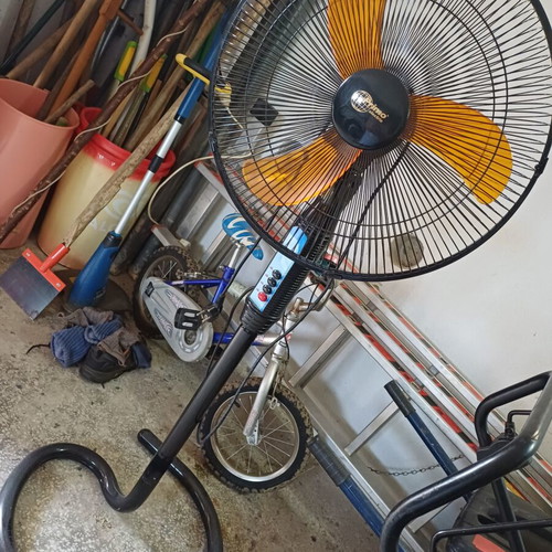 Primo standing fan, new, black with orange blades