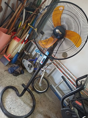 Primo standing fan, new, black with orange blades