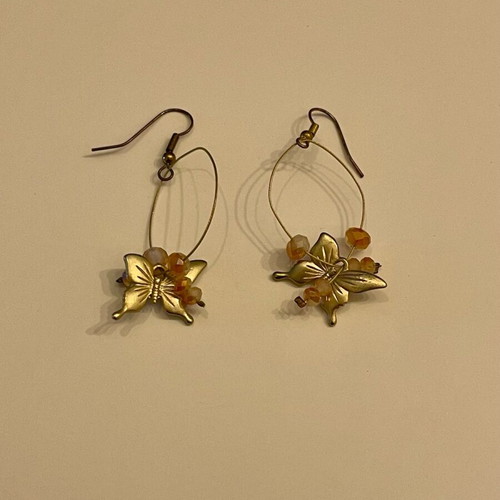 Earrings like new with butterfly and beads