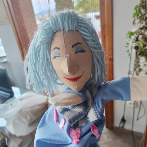 Handmade doll for collectors or puppet theatre on wooden base
