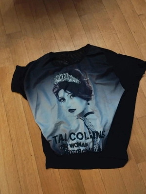 Black blouse with face print, like new, size L