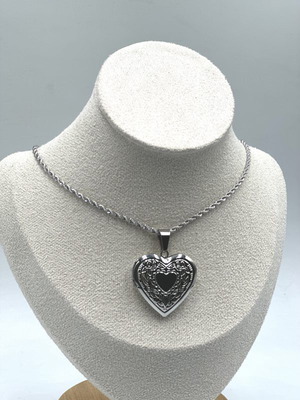 Pendant with hanging openable heart in silver color, new