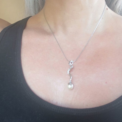 White gold, natural pearl