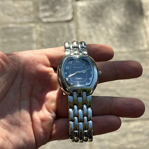 Christian D. Quartz watch with blue dial and metal bracelet