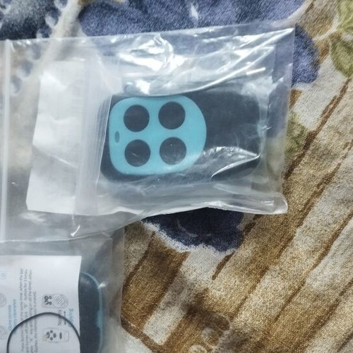 Garage door remote new, single piece