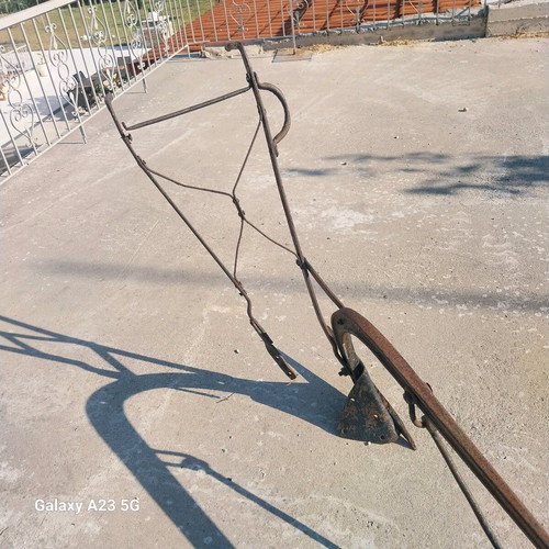Plow used iron tool from 1940s for soil cultivation