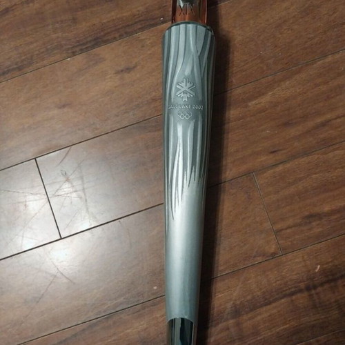 Olympic torch 2002 used with broken glass