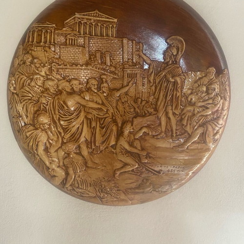 Decorative medal made of baked clay used, depicting Pericles from the 60s