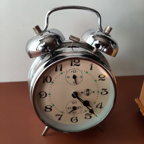 Set of two vintage wind-up clocks used, circa 1950