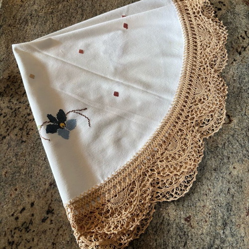 Round doily or small woven tablecloth with handmade edging like new