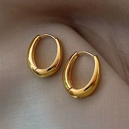 Classic copper alloy earrings gold color, new, size 24x18mm