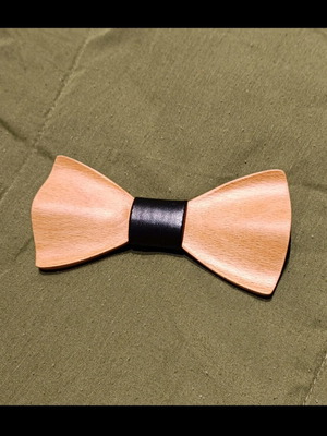 Wooden bow tie new with black leatherette center