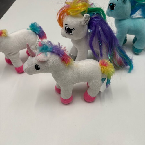 My Little Pony plush toys like new, set of 4 colorful ponies