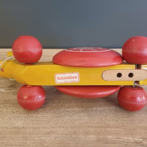 Kouvalias wooden toy used with minor wear on wheels