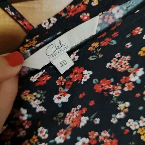 Floral mini dress L like new with crisscross detail on back