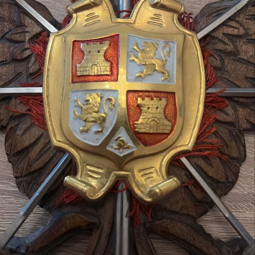 Vintage decorative Toledo wall coat of arms with swords used