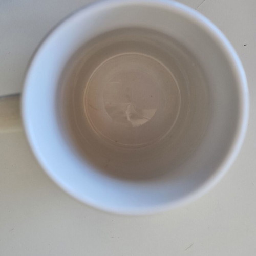 White semi-porcelain mug with the name Anna