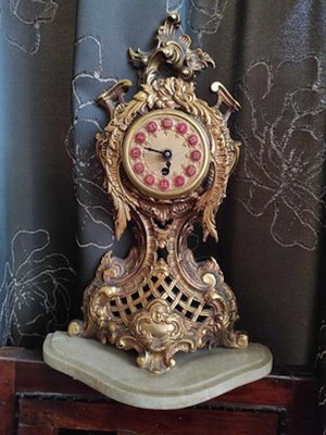 Solid brass clock used with marble base 40 cm height