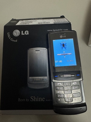 LG KE970 black phone used, original box and accessories