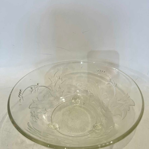 Vintage glass bowl with feet and flower patterns used