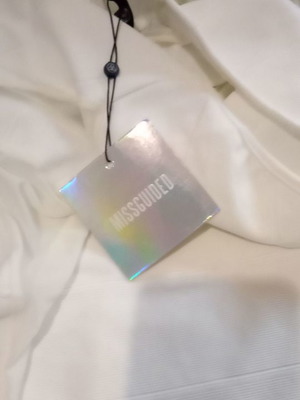 Missguided dress new with cut out transparency on sides, size M