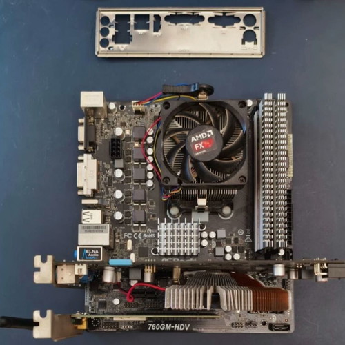 ASRock 760GM HDV motherboard with AMD FX-6300 CPU, 4GB RAM, GeForce 9600 GT GPU