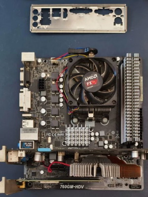 ASRock 760GM HDV motherboard with AMD FX-6300 CPU, 4GB RAM, GeForce 9600 GT GPU