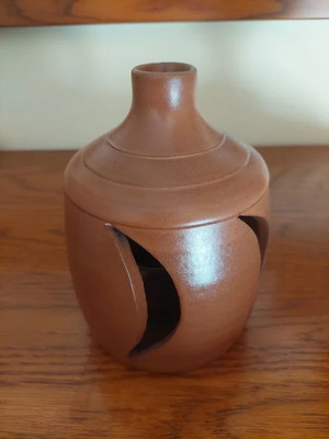 Ceramic Candle Holder like new, terracotta cut-out design