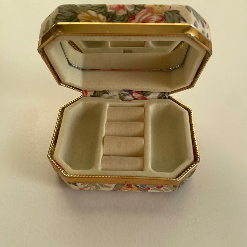 Vintage jewelry box used with mirror and floral fabric design