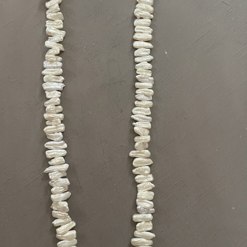 Vintage pearl necklace with elongated cultured white pearls like new