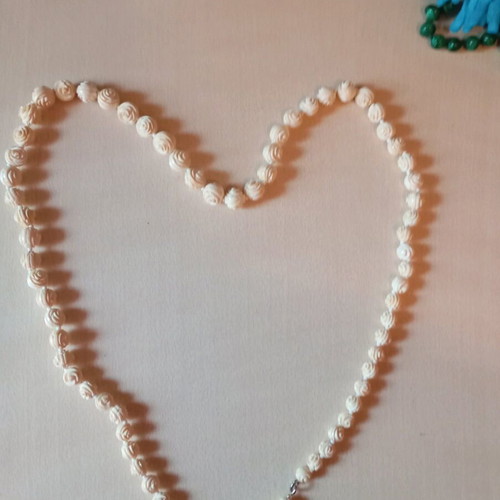 Makris Handcrafted Carved Necklace Like New