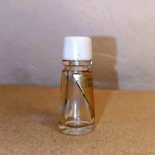 Hypnotique miniature bottle by Max Factor used, collectible
