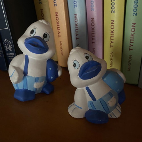 Decorative duck figurines both