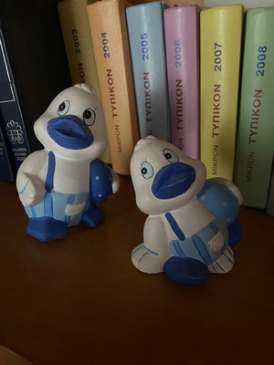 Decorative duck figurines both