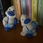 Decorative duck figurines both