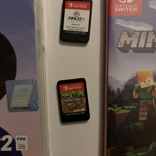 Nintendo Switch V2 with Pro Controller, Minecraft and FIFA 22