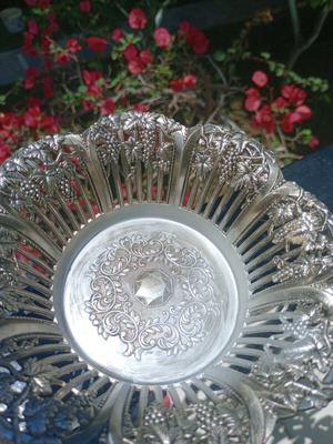 Silver-plated ornate bowl with vine like new