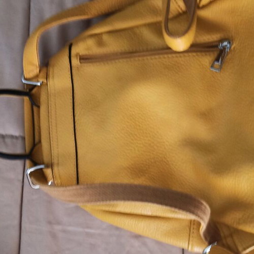 Backpack like new, yellow color