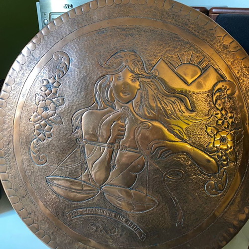 Decorative copper plate with embossed goddess of justice like new
