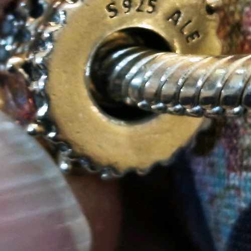 Pandora bracelet authentic used size 16 with 6 charms and safety chain