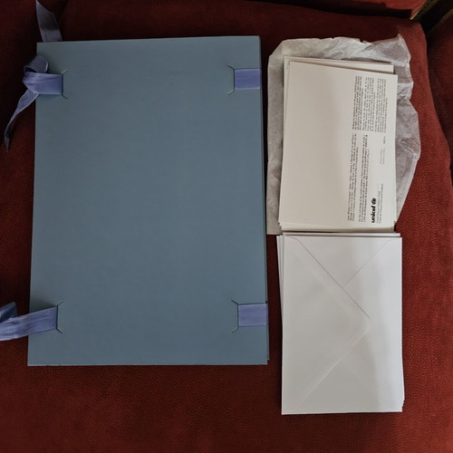 Vintage UNICEF collectible set with dossier and 6 cards