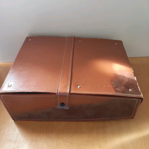 Russian projector used with leather case and film