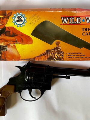 12-shot cap gun used, vintage, metal with plastic handle