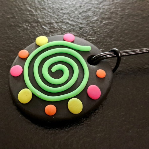 Handmade fluo pendant with spiral design like new