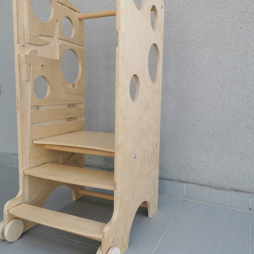 Montessori learning tower with accessories and instruction book